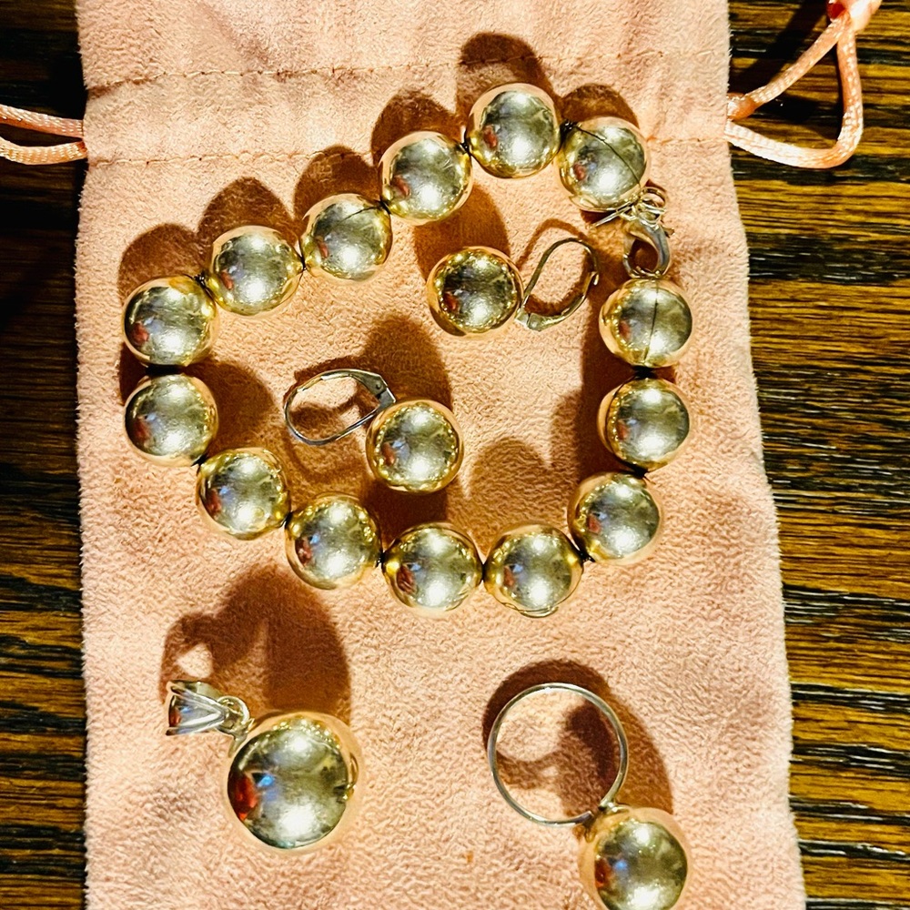 Elegant Sterling Silver Jewelry Set- Bracelet, earrings, ring, and pendant.